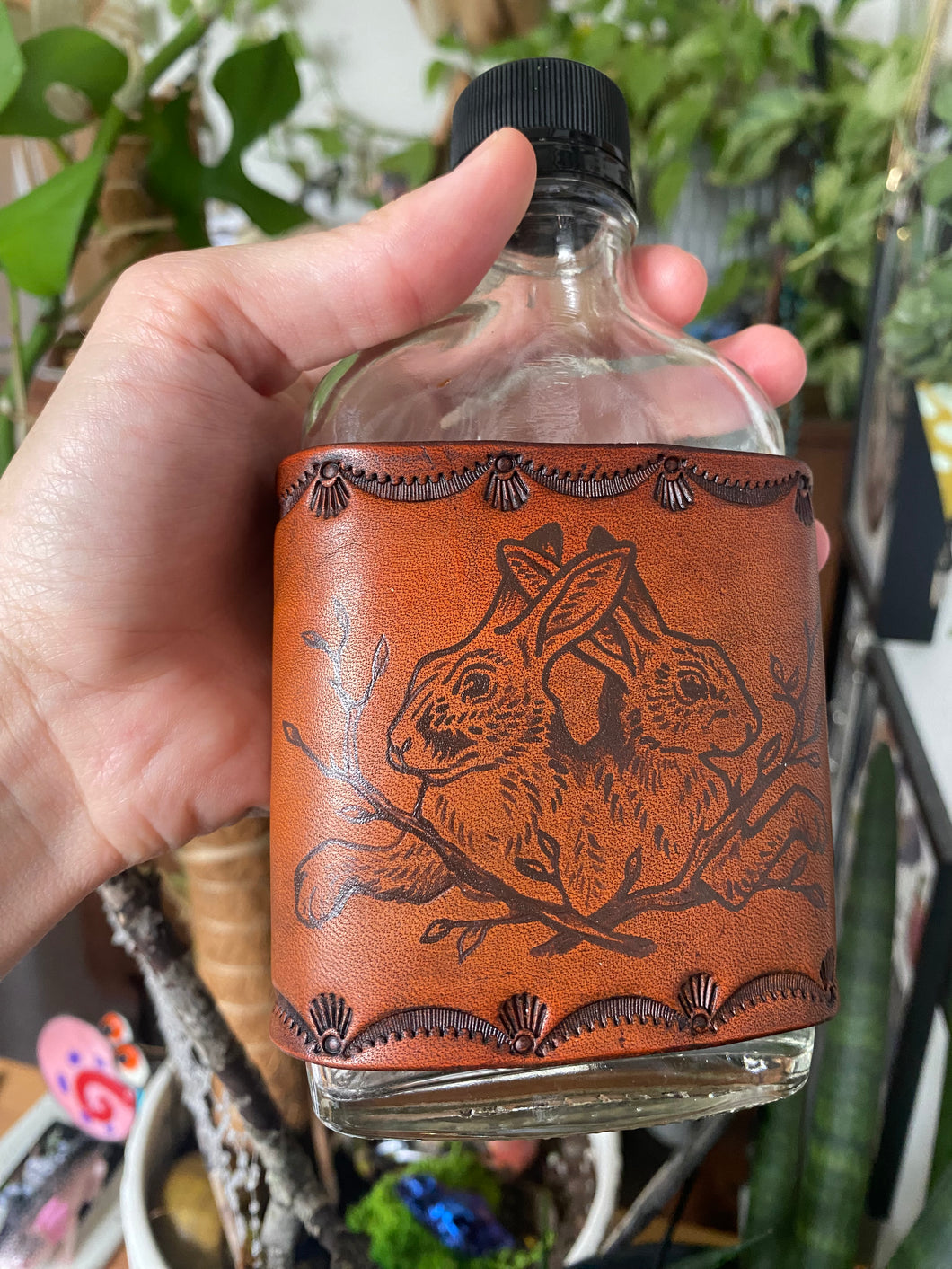 Hand stitched and painted flask